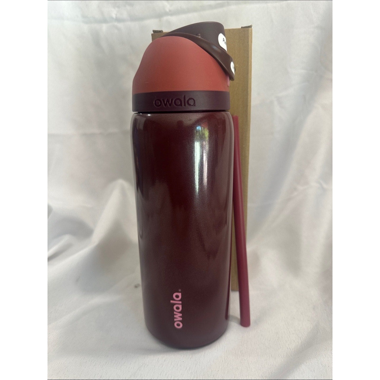 Owala insulated water bottle with a built-in straw. Burgundy 32oz